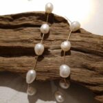 brinco de perolas naturais longo fino ddaaaa