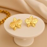 brinco de pressao de flor de metal orquidea elegante dddssdss