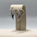 brinco de pressao de folha de metal prata vazado moderno 43dd