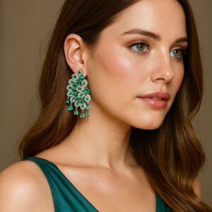 brinco turquesa e prata de festa estilo asa de zirconias elegante ss