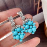 brinco azul e prata de festa ao ar livre elegante estilo cacho sd