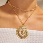 colar de caracol dourad do dd