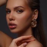 maxi brinco dourado de caracol ff