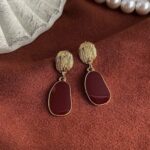 brinco de pressao marsala com dourado elegante minimalista d