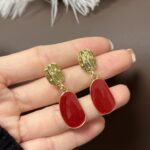 brinco de pressao marsala com dourado elegante minimalista ttcxddd