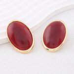 brinco dourado com pedra marsala oval grande ddf