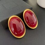 brinco dourado com pedra marsala oval grande ffrrf (gg1)