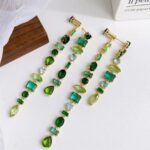 brinco de festa verde esmeralda longof