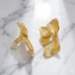 brinco de pressão dourado grande de folha modernor g